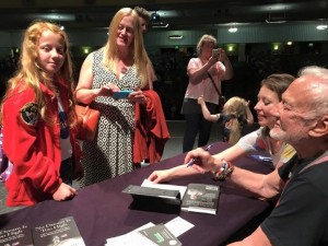 Megan and mum with Buzz Aldrin